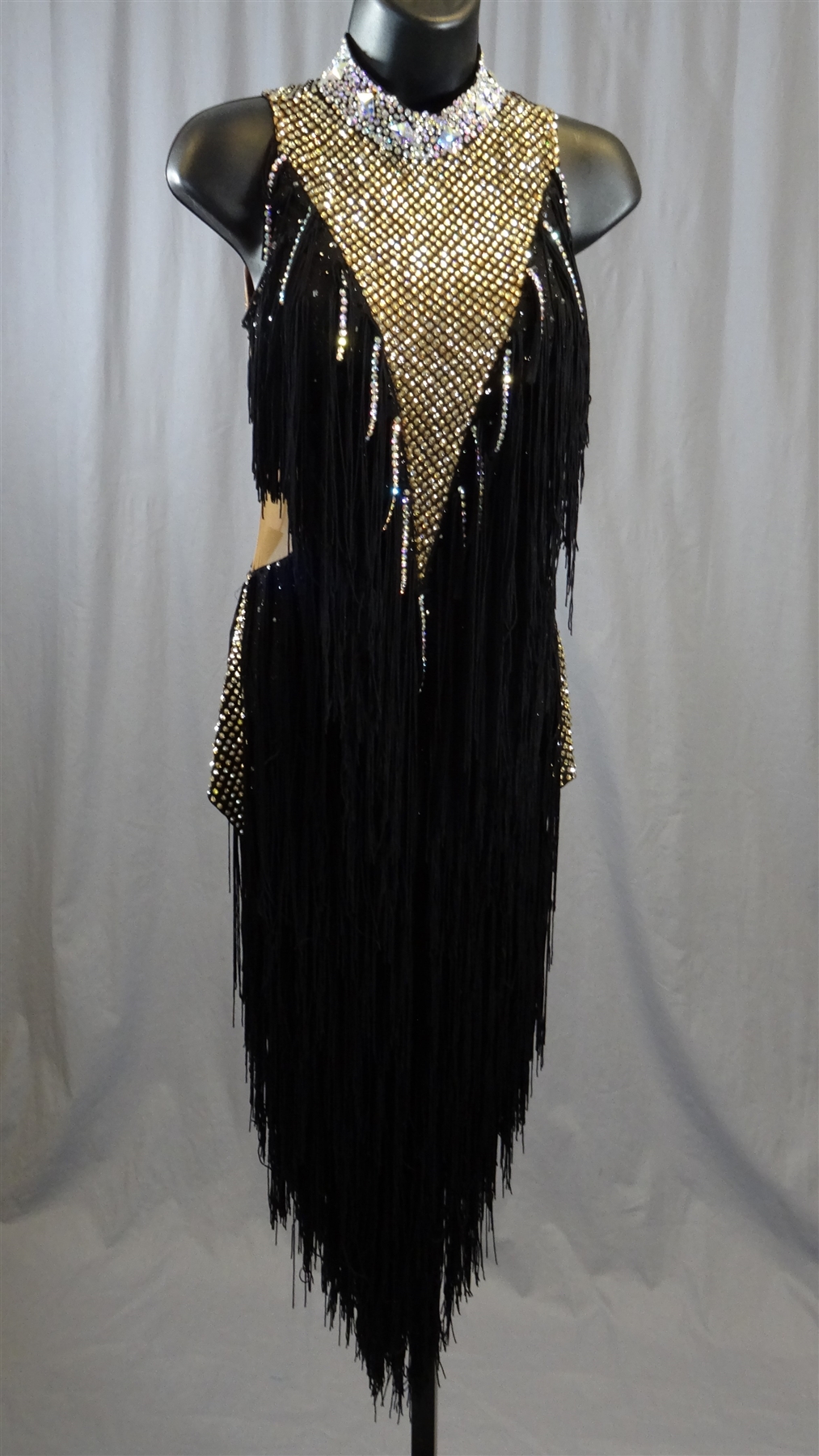 black and gold tassel dress